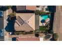Aerial view of house with pool and backyard, ideal for summer fun at 109 E Milada Dr, Phoenix, AZ 85042