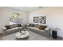 Cozy living room with two sofas and a coffee table at 1552 E Oak Rd, San Tan Valley, AZ 85140
