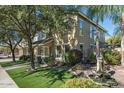 Two-story house with landscaping, front porch, and fountain at 18456 E Superstition Dr, Queen Creek, AZ 85142