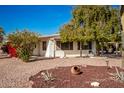 White single story home with mature trees and desert landscaping at 430 S 81St Pl, Mesa, AZ 85208
