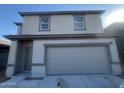 Two-story house with attached garage, under construction at 47651 W Cansados Rd, Maricopa, AZ 85139