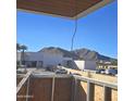 View from a balcony under construction, showing mountain views and parking lot at 6587 N Palmeraie Blvd # 2017, Paradise Valley, AZ 85253