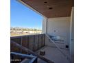 Unfinished patio with mountain views and built-in fire pit at 6587 N Palmeraie Blvd # 2017, Paradise Valley, AZ 85253