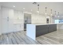 Spacious kitchen with stainless steel appliances and island at 8709 E Irish Hunter Trl, Scottsdale, AZ 85258