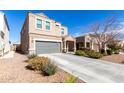 Two-story house with gray garage door and landscaping at 4726 E Chromium Rd, San Tan Valley, AZ 85143
