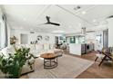 Open concept living and kitchen area with hardwood floors at 8214 E Northland Dr, Scottsdale, AZ 85251