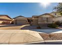 Beautiful home with stone accents and a 3-car garage at 22091 E Russet Rd, Queen Creek, AZ 85142