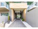 Modern building entrance with pathway at 5455 E Lincoln Dr # 1001, Paradise Valley, AZ 85253