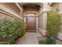 Inviting entryway with double doors and landscaping at 10232 N 54Th Pl, Paradise Valley, AZ 85253
