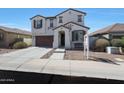 Inviting two-story home with a classic design, a cozy bench, and a convenient two-car garage at 3446 N Mayfair St, Mesa, AZ 85213