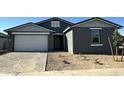 Charming single-Gathering home with a two-car garage and minimal landscaping at 5510 W Paseo Way, Laveen, AZ 85339