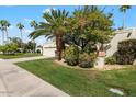 Home exterior showcasing attractive landscaping and curb appeal at 8466 E San Benito Dr, Scottsdale, AZ 85258