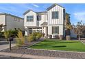 Two-story home with front yard, driveway, and modern exterior at 3750 E Earll Dr, Phoenix, AZ 85018