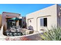 Inviting patio with seating area, perfect for outdoor dining and relaxation at 18658 E Mazatzal Cir, Rio Verde, AZ 85263