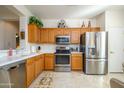Well-equipped kitchen featuring stainless steel appliances at 20516 N Vermillion Cliffs Dr, Surprise, AZ 85387