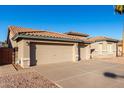 Two-story house with a two-car garage and desert landscaping at 474 E Sheffield Ave, Gilbert, AZ 85296