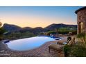 Inviting pool and spa with mountain backdrop at 10532 N Crestview Dr, Fountain Hills, AZ 85268