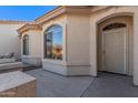 Front entry with security door and sidelight windows at 10960 E Monte Ave # 125, Mesa, AZ 85209