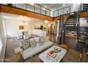 Open living area with loft-style architecture and city views at 1326 N Central Ave # 416, Phoenix, AZ 85004