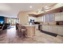 Spacious kitchen with island and stainless steel appliances at 3800 S Cantabria Cir # 1029, Chandler, AZ 85248