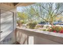 Private patio offering scenic views of the community landscaping at 6900 E Princess Dr # 1132, Phoenix, AZ 85054