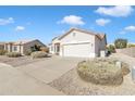 One story house with a two-car garage and desert landscaping at 1210 E Westchester Dr, Chandler, AZ 85249