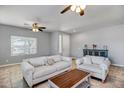 Living room features light walls and wooden coffee table at 13257 W Avenida Del Rey Dr, Peoria, AZ 85383