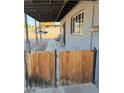 Front entrance with covered patio and wooden gate at 715 W 12Th St, Tempe, AZ 85281