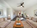 Bright living room featuring hardwood floors and neutral colors at 10958 E Secret Mine Ct, Gold Canyon, AZ 85118