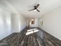 Spacious living area with hardwood floors and lots of natural light at 10958 E Secret Mine Ct, Gold Canyon, AZ 85118
