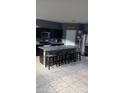 Well-lit kitchen features a large island with seating and stainless steel appliances at 30770 W Mitchell Dr, Buckeye, AZ 85396