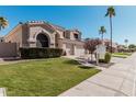 Two-story house with a three-car garage and a front yard at 3331 S Vine St, Chandler, AZ 85248