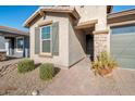 Front entry with stone accents and landscaping at 3392 E Strawberry Dr, Gilbert, AZ 85298