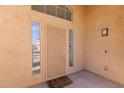 Welcoming entryway with a decorative metal door and sidelights at 343 W Bolero Dr, Tempe, AZ 85284