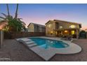 Spacious backyard with a refreshing pool and relaxing patio furniture at 343 W Bolero Dr, Tempe, AZ 85284