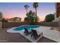 Inviting backyard oasis featuring a sparkling pool and lounge chairs at 343 W Bolero Dr, Tempe, AZ 85284