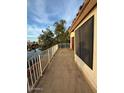 Balcony overlooking lake with metal railing at 3520 N 110Th Ave, Avondale, AZ 85392