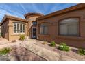 House exterior featuring a walkway and landscaping at 9610 E Rocky Lake Dr, Sun Lakes, AZ 85248