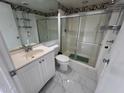 Bathroom includes a shower/tub combo, vanity, and tile floors at 12221 W Bell Rd # 363, Surprise, AZ 85378