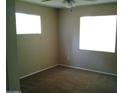 Bright bedroom with neutral walls and carpet at 1340 E Crescent Ave, Mesa, AZ 85204