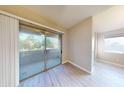 Living room with sliding doors leading to balcony at 1445 E Broadway Rd # 222, Tempe, AZ 85282