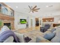 Spacious living room featuring a fireplace and an open floor plan at 20882 W Eastview Way, Buckeye, AZ 85396