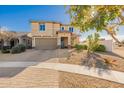 Two-story house with a two-car garage and front yard at 2413 E Alta Vista Rd, Phoenix, AZ 85042