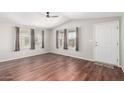 Bright living room with hardwood floors and neutral walls at 3104 E Broadway Rd # 9, Mesa, AZ 85204