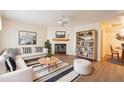 Living room features a fireplace and comfortable seating at 3249 W Maryland Ave, Phoenix, AZ 85017