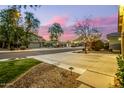 Neighborhood street view showing well-maintained homes, landscaping, and sidewalks at 4332 E Vallejo Ct, Gilbert, AZ 85298