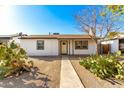 Charming white house with walkway and cacti at 4608 N 12Th Pl, Phoenix, AZ 85014