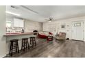 Living room with kitchen island and fireplace at 4608 N 12Th Pl, Phoenix, AZ 85014