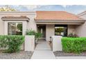 Well-maintained home with a walkway and lush landscaping at 6131 E Kings Ave, Scottsdale, AZ 85254