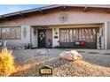 Front view of a ranch house with well-maintained landscaping at 723 S Edgewater Dr, Mesa, AZ 85208